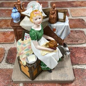 “Dreams In The Antique Shop” by Norman Rockwell